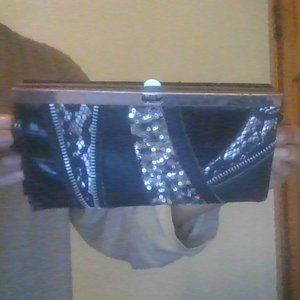 A black shiny wallet.